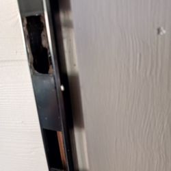 Lowe's Home Improvement - Bad dead bolt trim not flush with frame, over drilled, not secured to frame of door properly