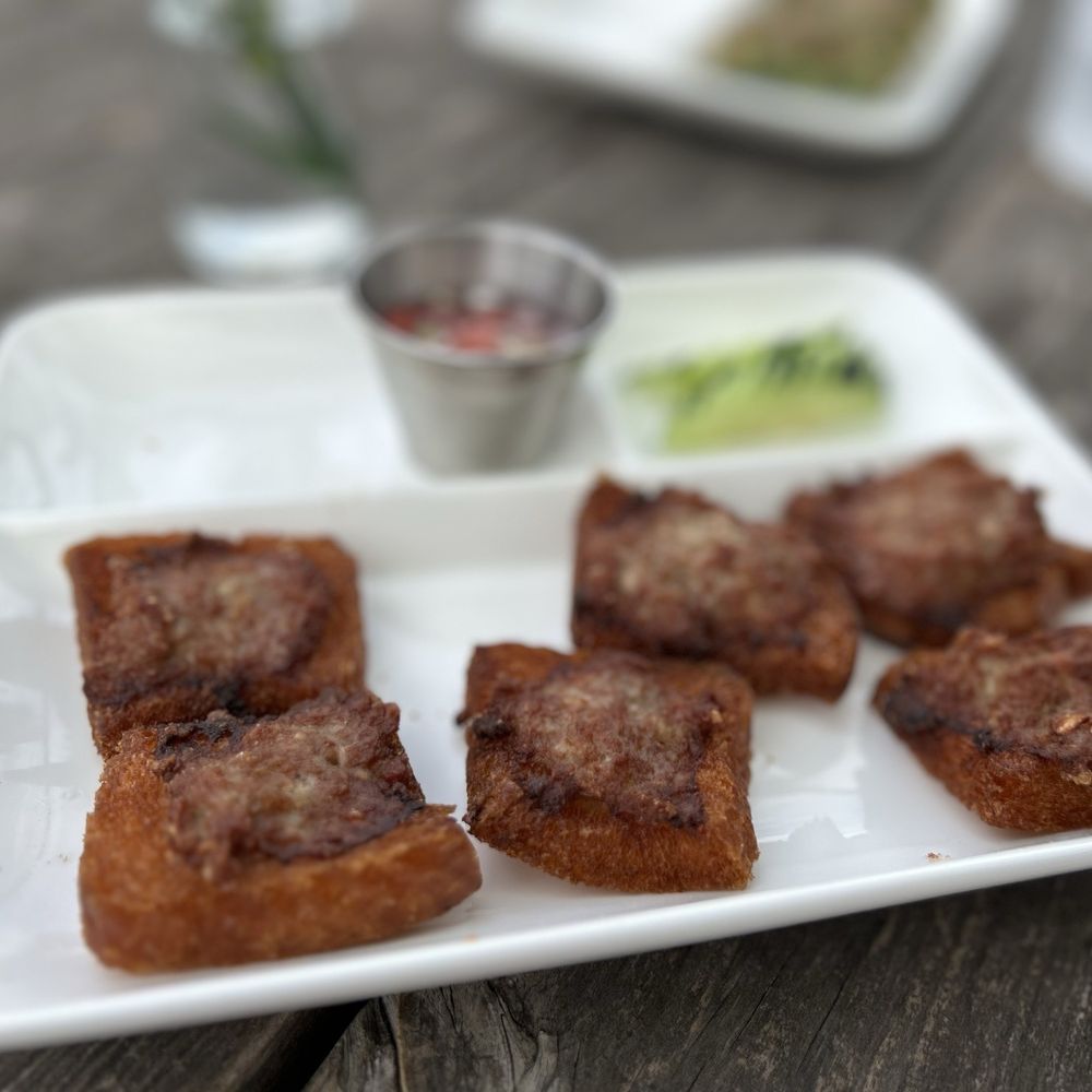 Thai Isan House - The fried pork bread is a must!! Lived the vinaigrette it was served with. - Thai Near Me - New Braunfels, Texas Thai Isan House - The fried pork bread is a must!! Lived the vinaigrette it was served with. - Thai Near Me - New Braunfels, Texas