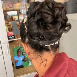 The style I left with, randomly pinned hair, manny pins. Ugly in the front, not sleek, with rabbi curls, ewww. The style I left with, randomly pinned hair, manny pins. Ugly in the front, not sleek, with rabbi curls, ewww.