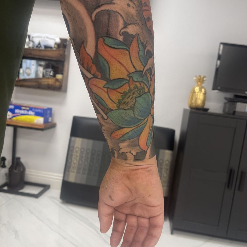 Golden Triangle Art Studio - Lotus flower on forearm - Tattoo Near Me - Upland, California Golden Triangle Art Studio - Lotus flower on forearm - Tattoo Near Me - Upland, California