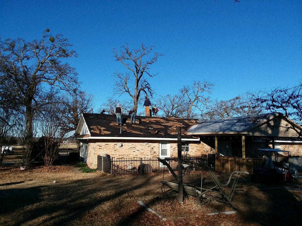 Slide of Rick's Roofing & Construction