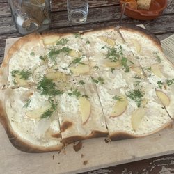 Restaurant Dampfschiff - Tarte flambee with sour cream, goat cheese, apples, and onion