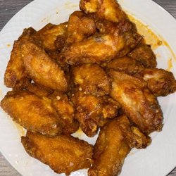 Robert's Bar & Grill at Paris Caterers - Best wings ever! Look at the size of theses wings. The Buffalo sauce is Robert's recipe and our guest are loving our wings!!
