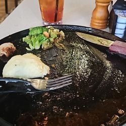 The Egg and Tequila Bar - Picture the perfect medium cooked riveted w/ onions and bell pepper slices on top. Sorry, ate it before I decided to take a picture.