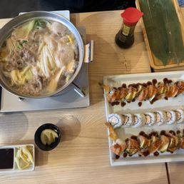 Shabu-shabu, 2 tiger dragon rolls and a california roll.