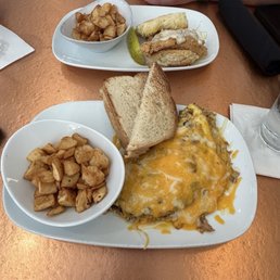 The Supreme Omelette The Supreme Omelette Fresh Country Potatoes BROKEN EGG® Biscuit Sandwich