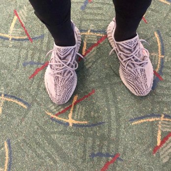 PDX Carpet - Adidas Yeezy 350 V2 and the carpet that is green with blue, red and yellow accents. - Local Flavor Near Me - Portland, Oregon