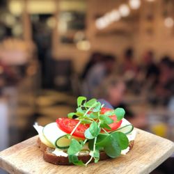 Fika Swedish Kitchen - The Snack – cheese, tomato, cucumber, snow pea tendrils on Fika's rye bread