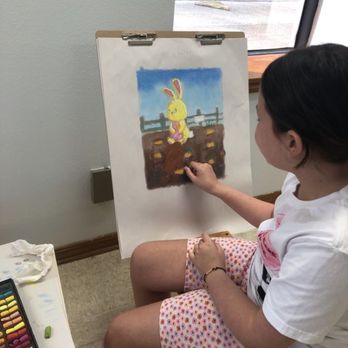 Life On Its Side Studios - Children's art class student working on a pastel picture. - Art Classes Near Me - Harahan, Louisiana