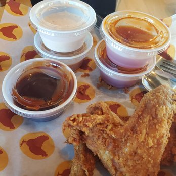 Joella's Hot Chicken - Indianapolis - Big wing and from top right clockwise  - spiked honey, cheerwine BBQ, pimento Ranchero - Southern Near Me - Indianapolis, Indiana