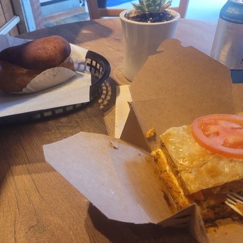 Nashoba Brook Bakery - Sausage tomato pie (similar to spinach pie) and an eclair. Both DELICIOUS! - Bakeries Near Me - Concord, Massachusetts Nashoba Brook Bakery - Sausage tomato pie (similar to spinach pie) and an eclair. Both DELICIOUS! - Bakeries Near Me - Concord, Massachusetts