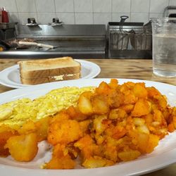 2 eggs any style + homefries + toast