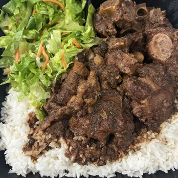 Barbican Square Jamaican Restaurant - Oxtail, white rice and salad - Caribbean Near Me - Miramar, Florida Barbican Square Jamaican Restaurant - Oxtail, white rice and salad - Caribbean Near Me - Miramar, Florida