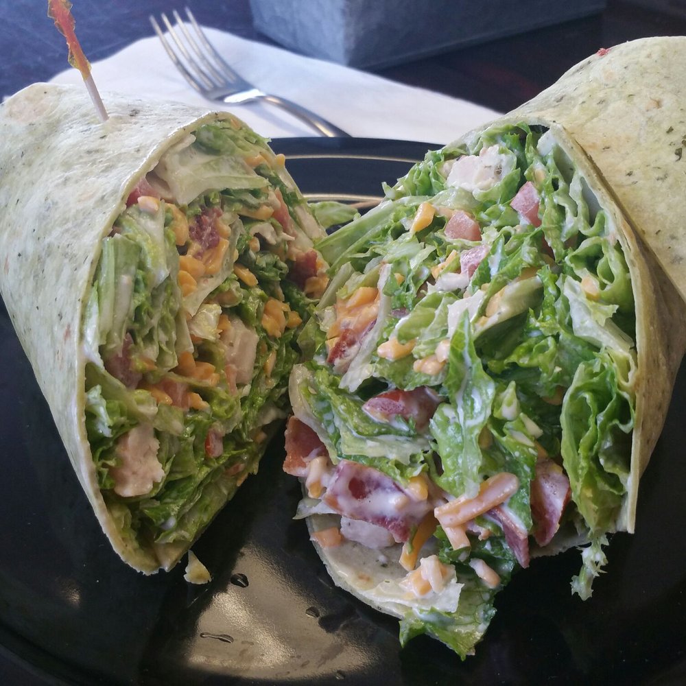 Rivers Edge Cafe - Chicken club wrap. This picture doesn't do the size of this wrap justice. The flavor is on point with crunchy bacon & lettuce. My new fave! - Cafes Near Me - Sumner, Washington Rivers Edge Cafe - Chicken club wrap. This picture doesn't do the size of this wrap justice. The flavor is on point with crunchy bacon & lettuce. My new fave! - Cafes Near Me - Sumner, Washington