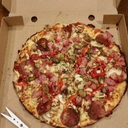 Pizza Capers - Large supreme. Peg added for a sense of size.