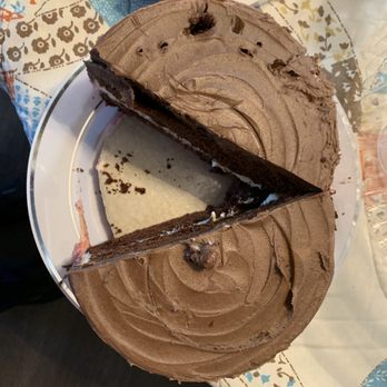 Piece O' Cake - Top of gluten-free wedding cake. The frosting is off color and dry. - Gluten-Free Near Me - Hagerstown, Maryland