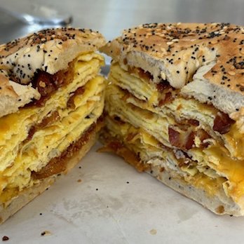 The Breakfast Cart - Triple Stack Bacon, Egg and Cheese on an Everything Bagel - Breakfast & Brunch Near Me - Orlando, Florida The Breakfast Cart - Triple Stack Bacon, Egg and Cheese on an Everything Bagel - Breakfast & Brunch Near Me - Orlando, Florida