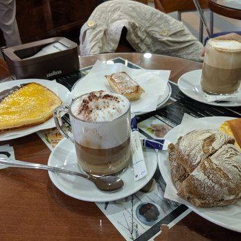 Pastelaria Veneza - My breakfast: 2 sweet pastries, one rye bread with butter, two capuccinos, one phyllo dough pastrie filled with ham and cheese - Patisserie/Cake Shop Near Me - Vila Praia de Âncora, 16 Pastelaria Veneza - My breakfast: 2 sweet pastries, one rye bread with butter, two capuccinos, one phyllo dough pastrie filled with ham and cheese - Patisserie/Cake Shop Near Me - Vila Praia de Âncora, 16