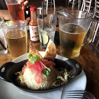 OHSO Distillery - This doesn't look like much but beneath the rice is MAGIC. Chile, pork, corn, and more. SOOO good. - New American Near Me - Scottsdale, Arizona