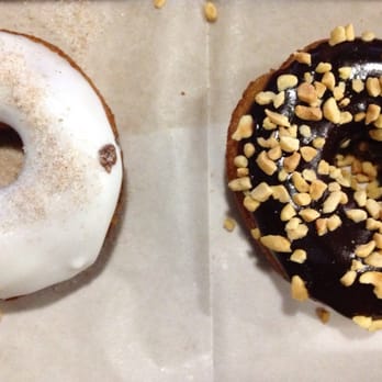 Duck Donuts - Vanilla icing with cinnamon sugar and chocolate icing with chopped peanuts! Chocolate icing is extremely sweet. - Donuts Near Me - Cary, North Carolina