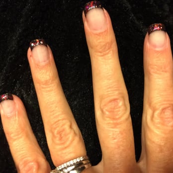 Nails & Spa - Fun Christmas colored sparkles over black nail tips gel polish - Nail Salons Near Me - Redding, California Nails & Spa - Fun Christmas colored sparkles over black nail tips gel polish - Nail Salons Near Me - Redding, California