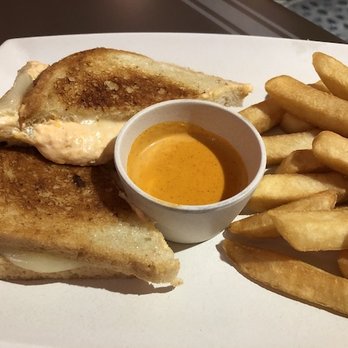 ABC Commissary - Buffalo Chicken Grilled Cheese Sandwich with Steak Fries - New American Near Me - Orlando, Florida ABC Commissary - Buffalo Chicken Grilled Cheese Sandwich with Steak Fries - New American Near Me - Orlando, Florida