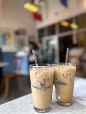 Photo of Immigrant Son Caffe - Ventura, CA, US. Iced vanilla latte with oatmilk and iced chai latte