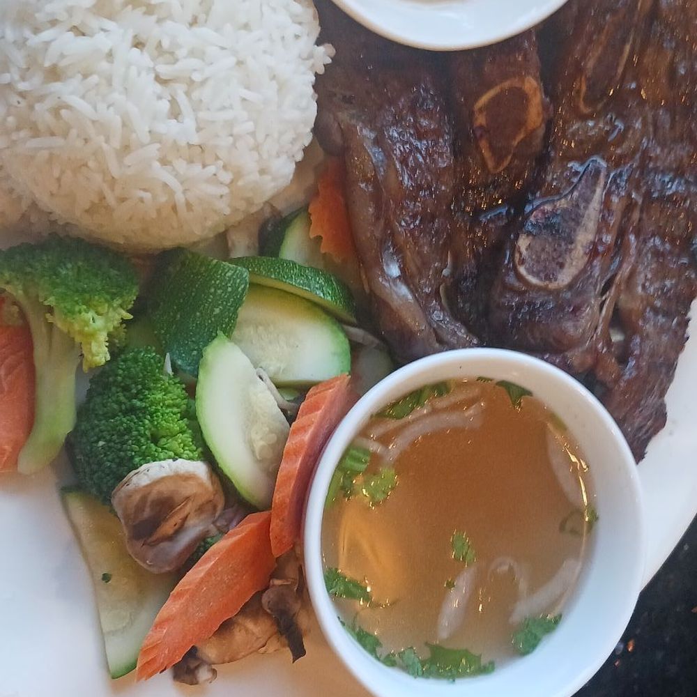 Beef Ribs, steamed vegetables, soup, rice. Beef Ribs, steamed vegetables, soup, rice.