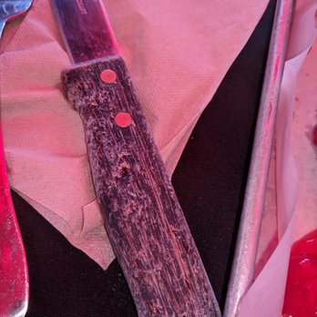 Brgr Stop - Nasty knife. The wood is...coming off and very wet. - Burgers Near Me - Coconut Creek, Florida