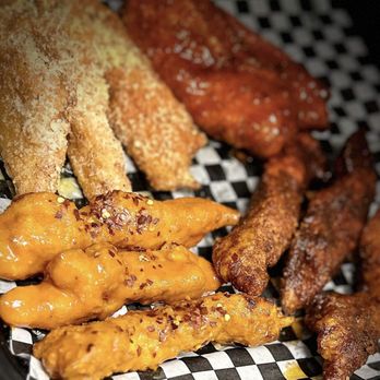 Hot Tender Wings - a variety of food on a checkered plate - Chicken Wings Near Me - Bakersfield, California