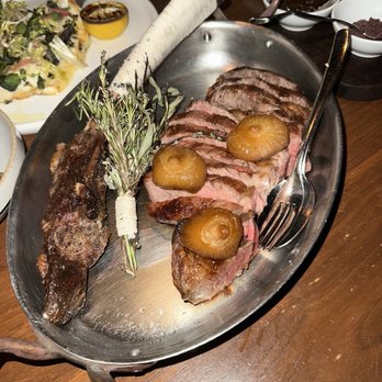 Ardor - Tomahawk with a side of peppercorn sauce and salt - New American Near Me - West Hollywood, California