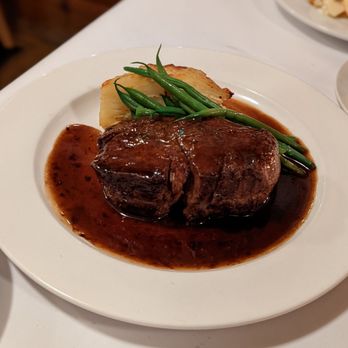Cafe Maddalena - a plate of beef with gravy and green beans - New American Near Me - Dunsmuir, California