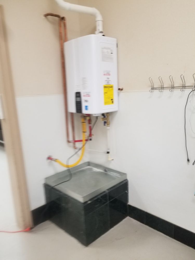 Slide of ER Tankless Water Heaters and Plumbing
