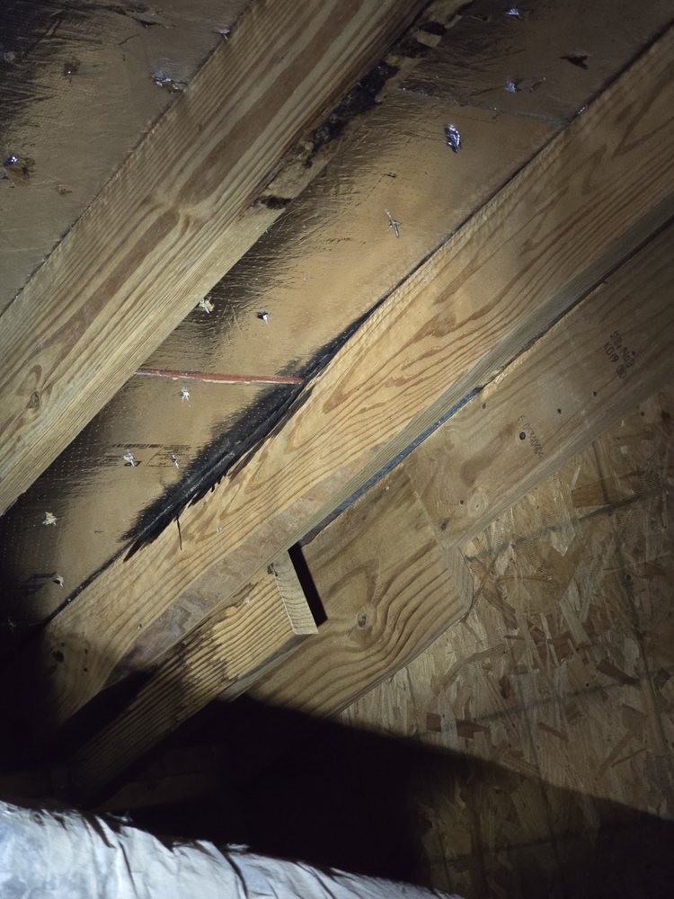 Slide of Anvil Roofers