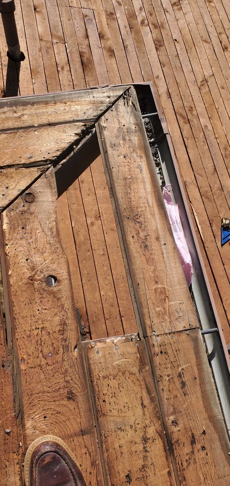 Slide of BD&E Roofing Services