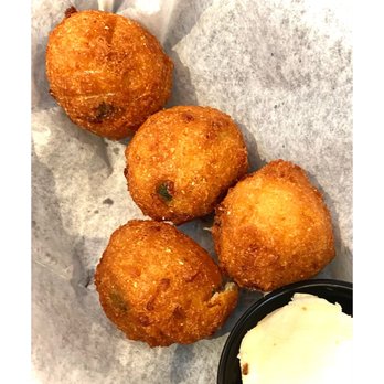 1885 Grill - Hush puppies with honey butter - Seafood Near Me - Acworth, Georgia 1885 Grill - Hush puppies with honey butter - Seafood Near Me - Acworth, Georgia