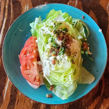 Santiago's Bodega - Wedge Salad, iceberg, blue cheese dressing, bacon, tomato slices $11 - Spanish Near Me - Altamonte Springs, Florida Santiago's Bodega - Wedge Salad, iceberg, blue cheese dressing, bacon, tomato slices $11 - Spanish Near Me - Altamonte Springs, Florida