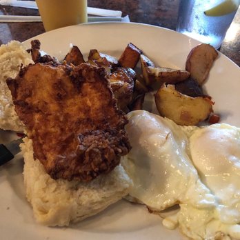 White Wolf Cafe - Chicken and biscuit with egg and home fries - New American Near Me - Orlando, Florida White Wolf Cafe - Chicken and biscuit with egg and home fries - New American Near Me - Orlando, Florida