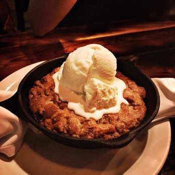 Prime Steakhouse - Freshly baked chocolate chip cookie with Vanilla ice cream (to share). - Bars Near Me - Redmond, Washington Prime Steakhouse - Freshly baked chocolate chip cookie with Vanilla ice cream (to share). - Bars Near Me - Redmond, Washington