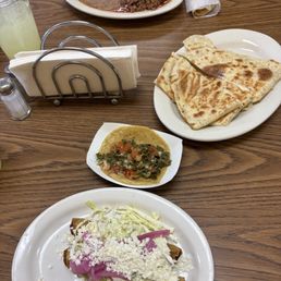 Birria plate, Quesadilla, Nopales and Cheese taco, potato flautas Birria plate, Quesadilla, Nopales and Cheese taco, potato flautas