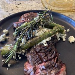 Wild Ginger - Hanger steak with crumbled bleu cheese and asparagus