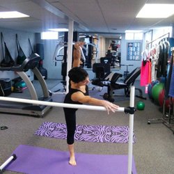 A Perfect Fit Fitness Studio - Warming up before teaching Booty Barre