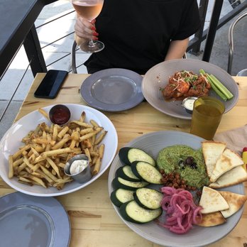 Second Nature - Green Hummus Plate Sunset and Truffle Fries and buffalo cauliflower - Breakfast & Brunch Near Me - San Diego, California Second Nature - Green Hummus Plate Sunset and Truffle Fries and buffalo cauliflower - Breakfast & Brunch Near Me - San Diego, California
