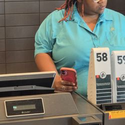 McDonald's - Manager on duty never set her phone down to help an employee in need.