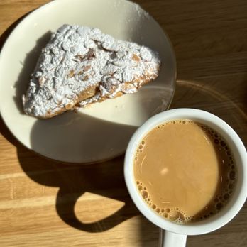 Flour Market - Almond croissant and drip coffee - Bakeries Near Me - Portland, Oregon