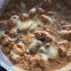 Villa italiano - Gnocchi bolognese al forno: baked gnocchi with a bolognese style meat sauce and mozzarella cheese.