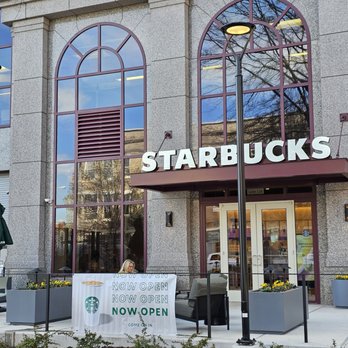 Starbucks - The entrance with a huge Starbucks sign outside the building. - Coffee & Tea Near Me - Roanoke, Virginia
