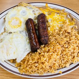 Sausage & Eggs: live a little and try a new combo. A bed of rice and beans. Sausage & Eggs: live a little and try a new combo. A bed of rice and beans.
