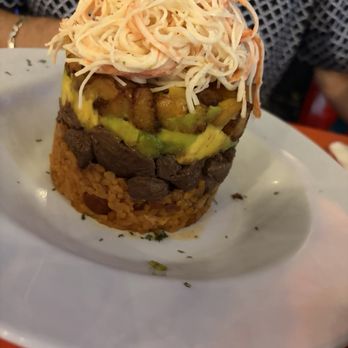 Casa Vieja - Tower of rice steak avocado and crab. - Sports Bars Near Me - Orlando, Florida Casa Vieja - Tower of rice steak avocado and crab. - Sports Bars Near Me - Orlando, Florida