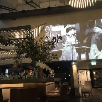 Pier One Sydney Harbour, Autograph Collection - The bar actually had silent movies projected onto the walls - pretty nifty - Hotels Near Me - Sydney, NSW